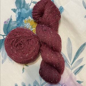 Two skeins of Americo fine tweed yarn